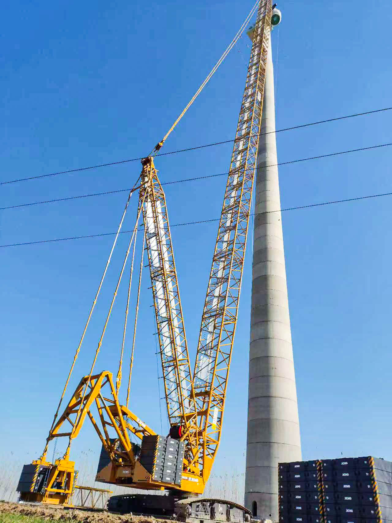 160米高空精準“搭積木”：徐工XLC15000M分體吊裝6.25兆瓦風機全紀錄